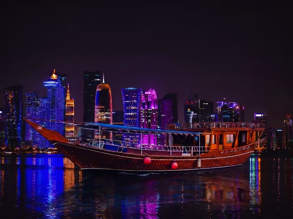 Doha Private Tour - Admire Doha’s illuminated skyline during an evening dhow cruise across the bay.