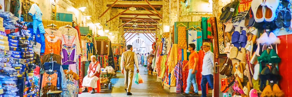 Doha Private Tour - Browse colourful textiles, traditional clothing and local handicrafts at Souq Waqif in Doha.