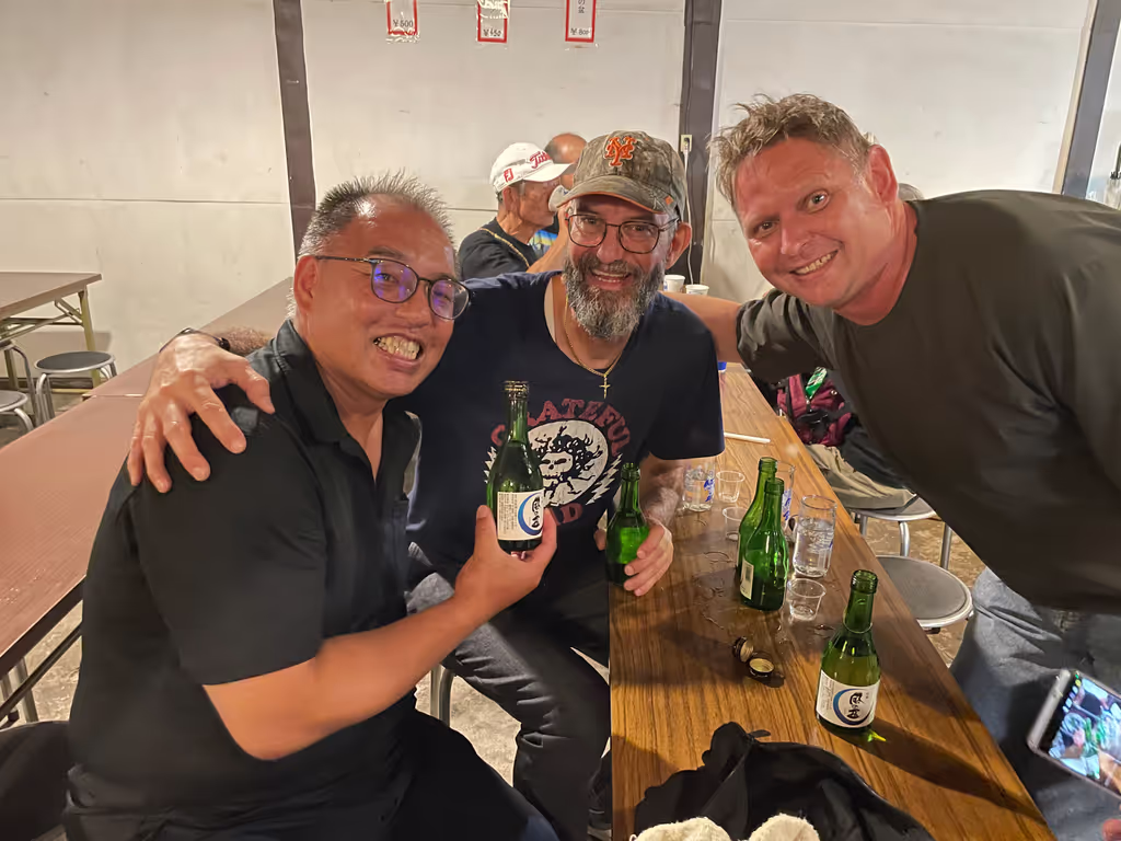 Toyama Private Tour - Owara Kaze no Bon Festival Cultural Exchange - Enjoying spirited conversation with Austrian guests at Yatsuo Owara Kaze no Bon festival, celebrating Toyama's authentic traditions and local spirit.