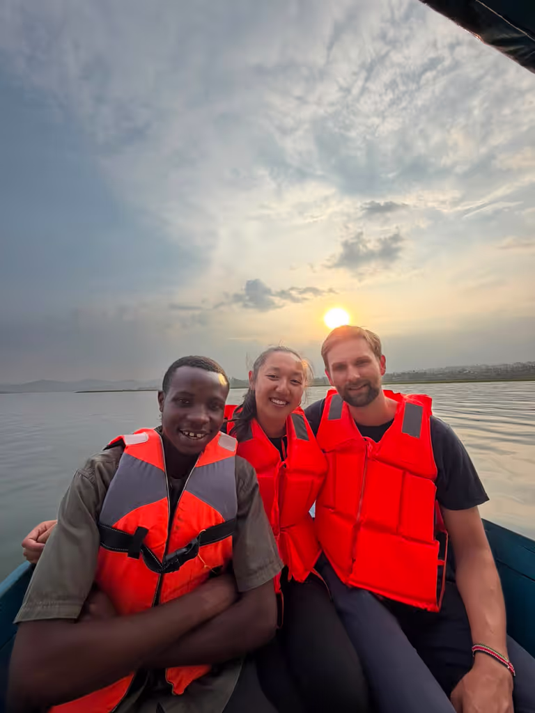 Ruhengeri Private Tour - sunset boat tour on Twin Lake  with my guests - relaxing experience after safari