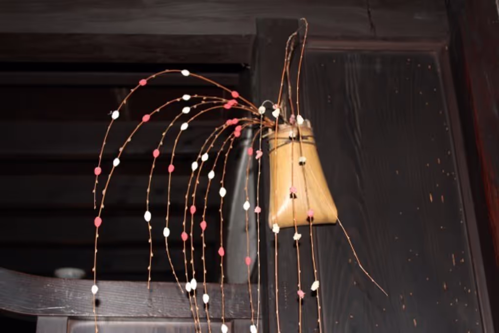 Kyoto Private Tour - People used to decorate rooms with Mayudama decoration comprising a willow twig hung 
with cocoon-shaped rice cakes during a New Year's Season.