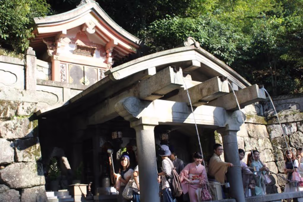 Kyoto Private Tour - This is Otowa no Taki waterfall.  The three streams symbojize  good health academic achievement and 
finding a good match in marrige.