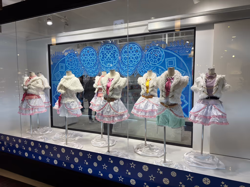 Tokyo Private Tour - Holy site: the outfits for the song "Snow Halation" worn on stage by the legendary school idol group μ's from the anime "Love Live"