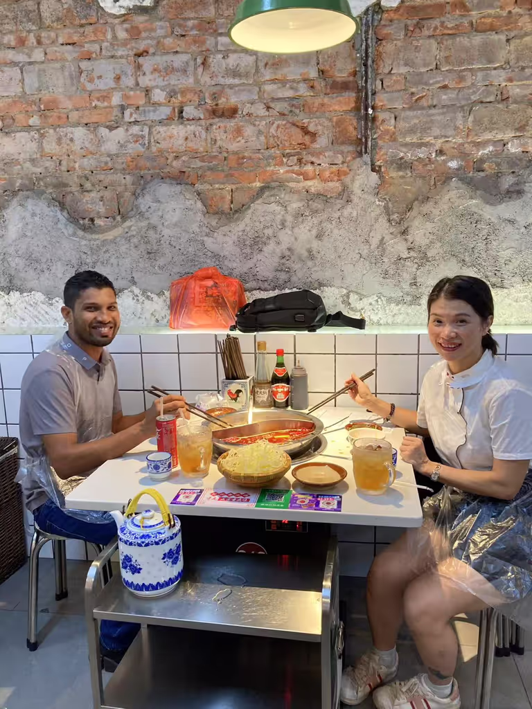 Guangzhou Private Tour - Sharing a hotpot feast with guests — a taste of authentic local dining in Guangzhou.