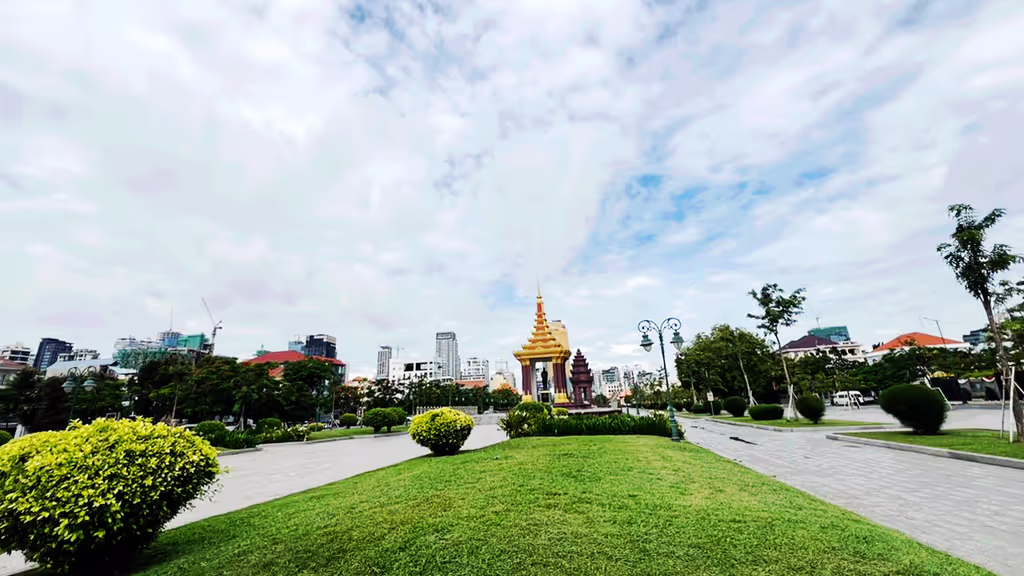 Siem Reap Private Tour - King Sihanouk Memorial Park, Phnom Penh – a spacious green space in the heart of the city, home to the grand statue of King Norodom Sihanouk and the nearby Independence Monument, symbolizing Cambodia’s freedom and modern history.