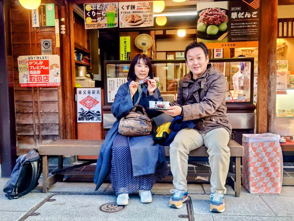 Tokyo Private Tour - Guides eating Rice cakes