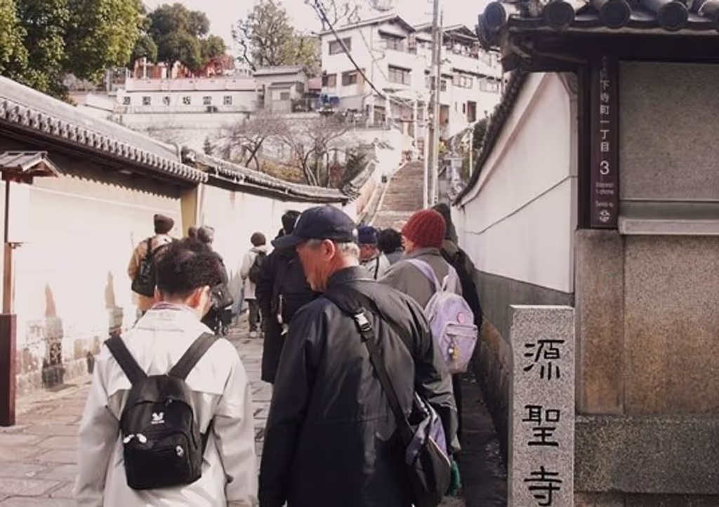 Osaka Private Tour - Locals up and down the hill