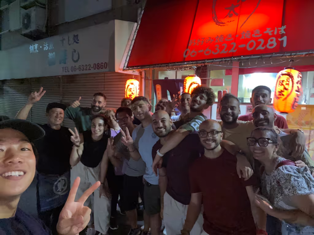 Osaka Private Tour - Italian tourists and Japanese people