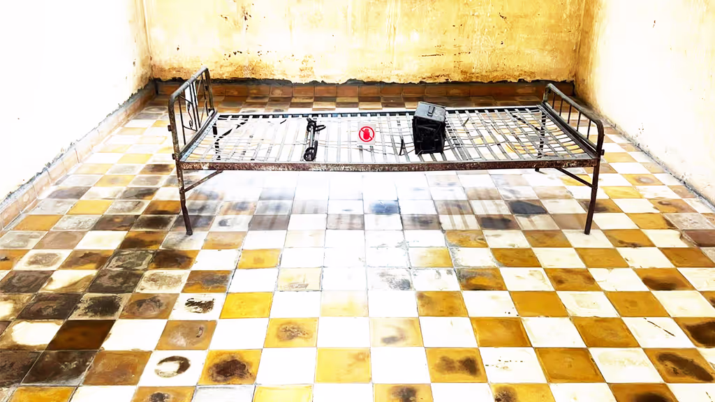 Siem Reap Private Tour - Prison cell at Tuol Sleng Genocide Museum
