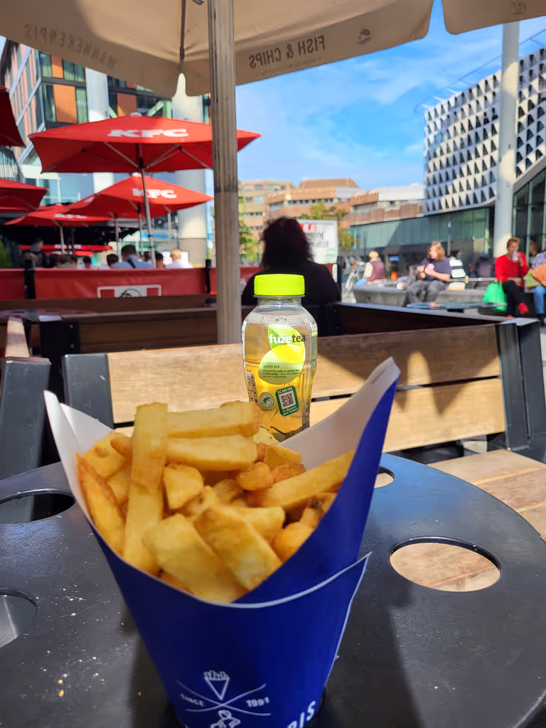 Amsterdam Private Tour - Enjoying Belgian-style fries at Manneken Pis