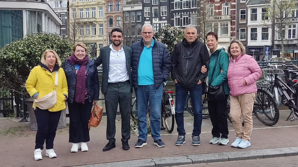 Amsterdam Private Tour - Guests enjoying Dutch treats together with guide
