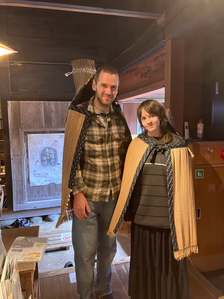 Toyama Private Tour - Try on a traditional straw raincoat