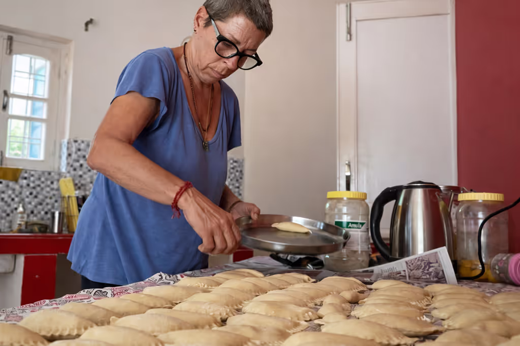 Rishikesh Private Tour - Preparing dough in a cosy kitchen