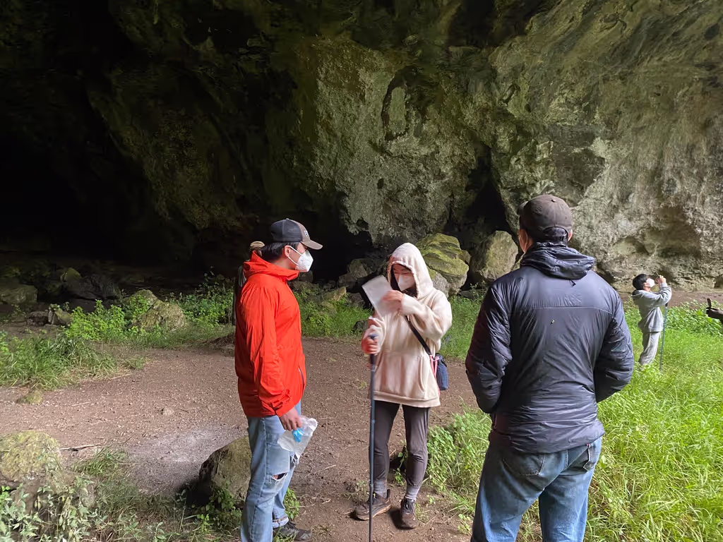 Mbale Private Tour - Visitors standing inside Tutum Cave