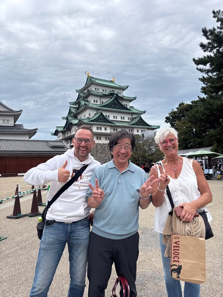 Nagoya Private Tour - Big Smiles with guests in front of Castle