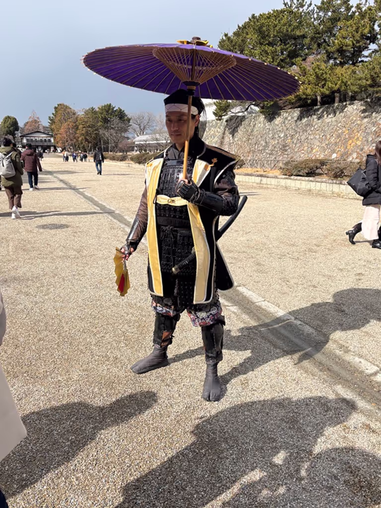 Nagoya Private Tour - Brave Samurai Load stands on Nagoya Castle
