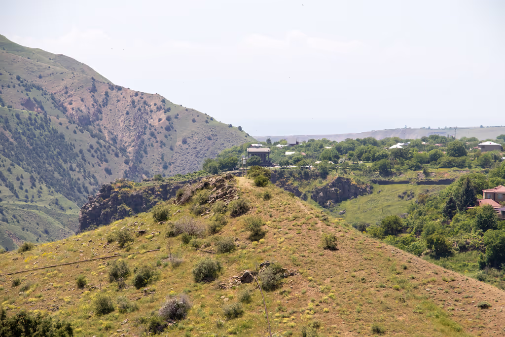 Yerevan Private Tour - Panoramic view of Garni Temple perched above the g