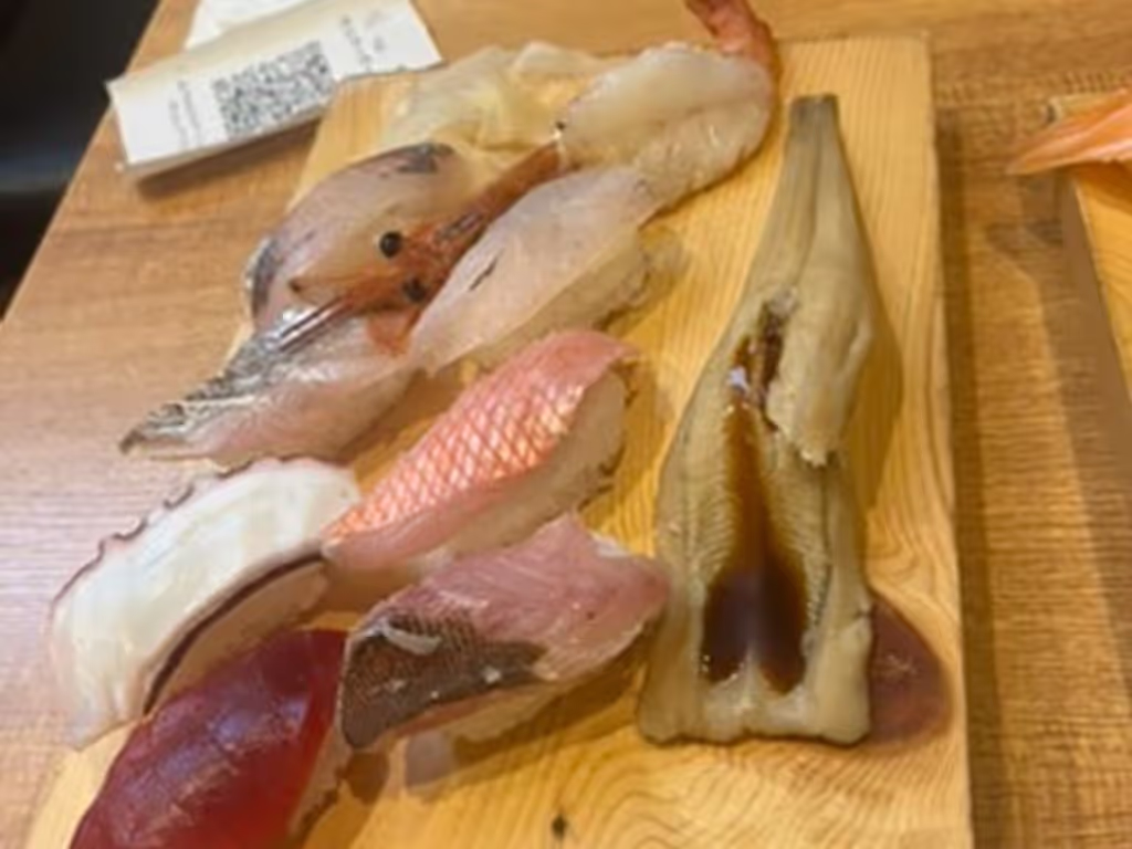 Kobe Private Tour - Local seafood shared during a Kobe food tour