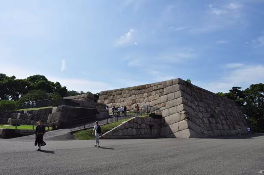 Tokyo Private Tour - 7. Base of the main tower (Donjon) where you can enjoy the nice view of the garden as well as the modern buildings of Tokyo surrounding the palace.