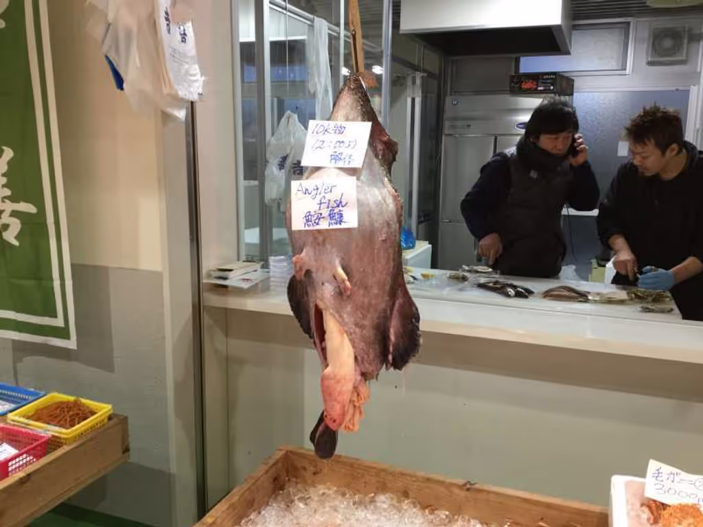 Tokyo Private Tour - A monkfish hanged to slice it