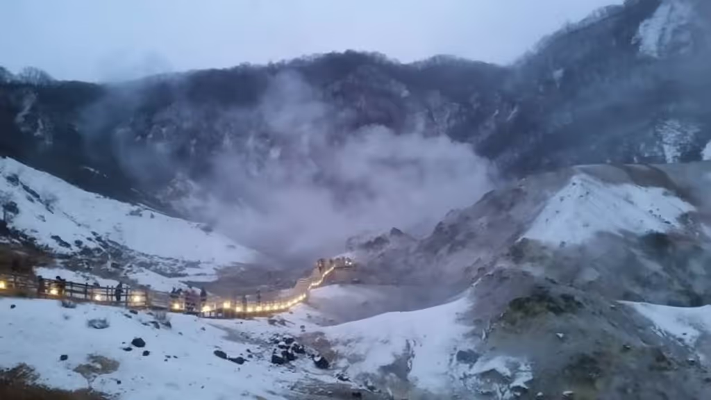 Sapporo Private Tour - Jigokudani (Hell Valley): 
It is a volcanic caldera created by the eruption of Mt. Hiyoriyama, and is the largest hot spring source in Noboribetu Onsen. Due to strong rotten egg-like sulfur smell of boiling sulfur from various holes in this valley, it is known as Hell Valley. Moreover, the tourists can also enjoy the bath in uncountable water hot spring in this area.