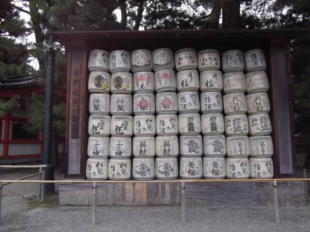 Kyoto Private Tour - Bales of "sake" rice wine donated by brewers. They expressed their allegiance to the shrine.