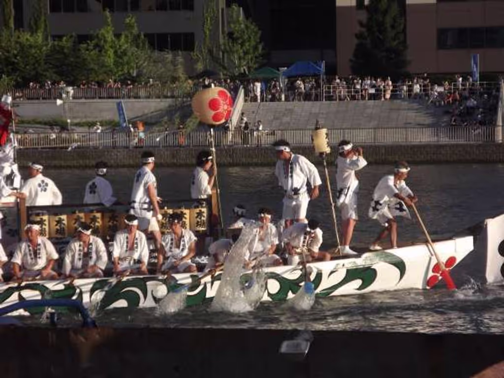 Osaka Private Tour - Raft with festival organizers on board.