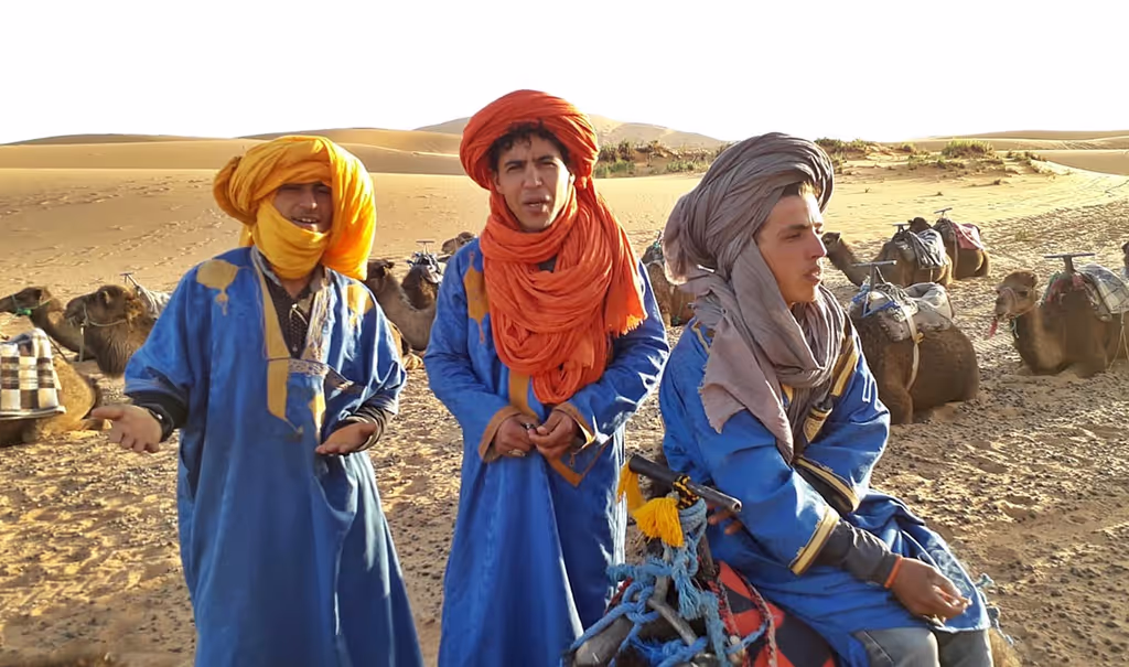 Marrakech Private Tour - Sahara Desert Tour - Camelters Pose in Sun rise time