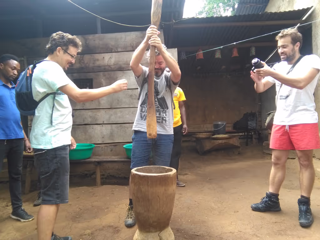 Kilimanjaro Private Tour - grinding coffee