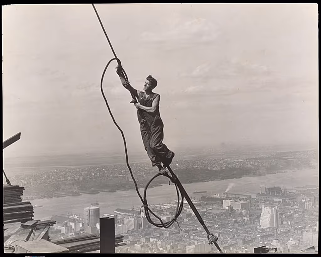 New York Private Tour - "Icarus, Empire State Building", by Lewis Hine. A worker during the Empire State Building construction 