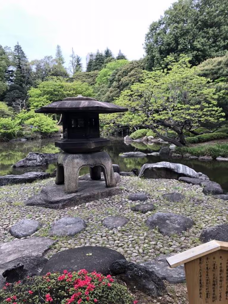 Tokyo Private Tour - Japanese garden.  This large stone lantern creates deeper atmosphere in quiet space.