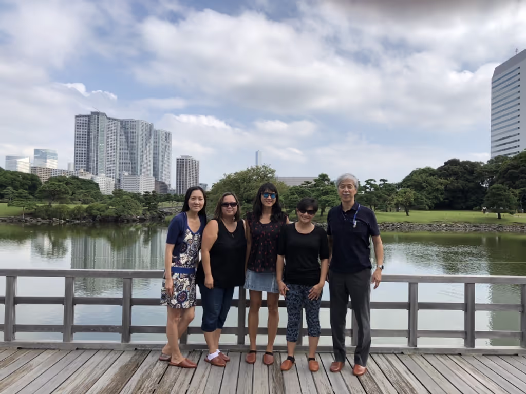 Tokyo Private Tour - Four guests from Canada at the deck in Tea House on the pond in Hamarikyu Japanese style Gardens.
