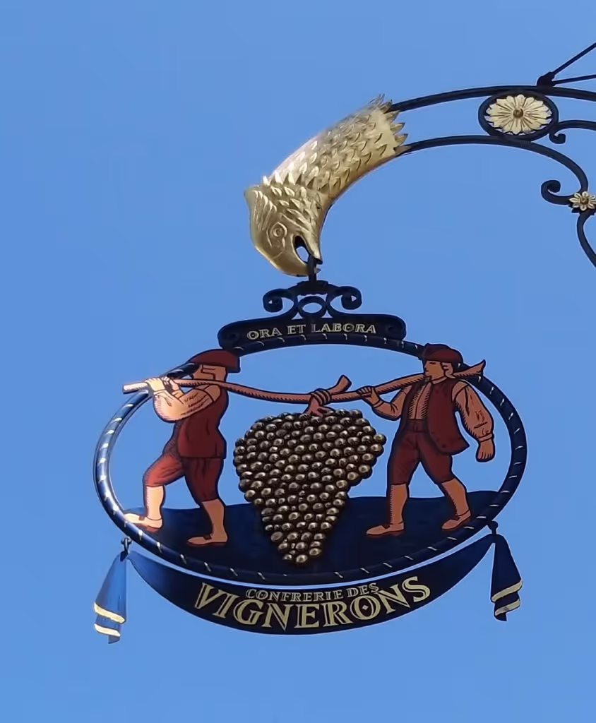 Alsace Private Tour - Intricate signs of the city's merchants.