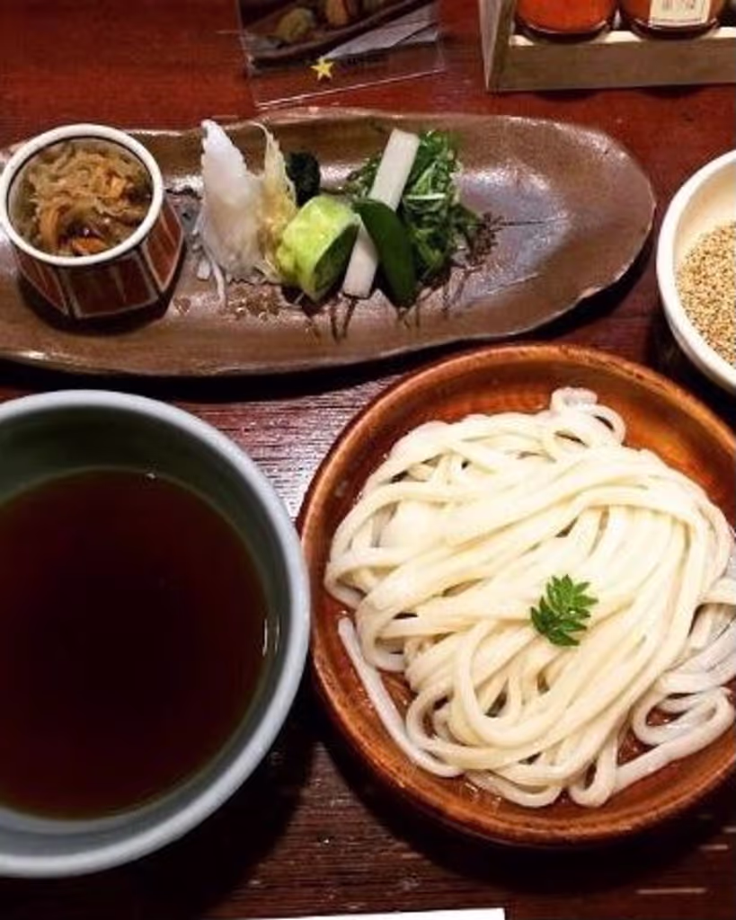 Kyoto Private Tour - Udon noodle with 7 kinds of sliced vegetables, dipping  in soup together, eating moderate quantity one by one.
You taste them together with Just deep fried Tempura and vegetated mackerel sushi .
It will cost about Jyen1600.