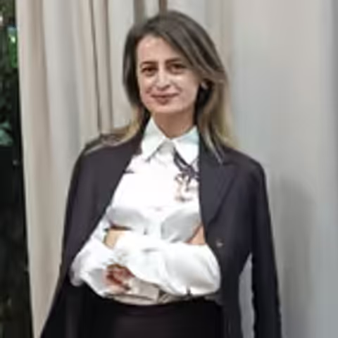 Xhuljana Q.