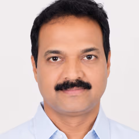 Karuna K.