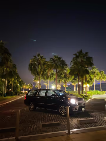 Dubai pick up and drop off in Abu-Dhabi by luxury GMC vehicle