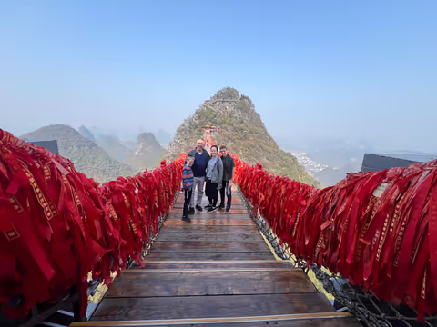 Cave + cable car mountain (Ruyi Peak) + bike ride