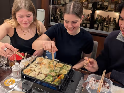 Explore Osaka Like a Local: Takoyaki Cooking, Karaoke & Dotonbori Walk (Half-Day Tour)