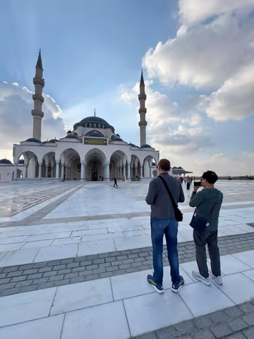 Dubai to Sharjah Full Day City Tour with Grand Mosque & Hotel Pickup