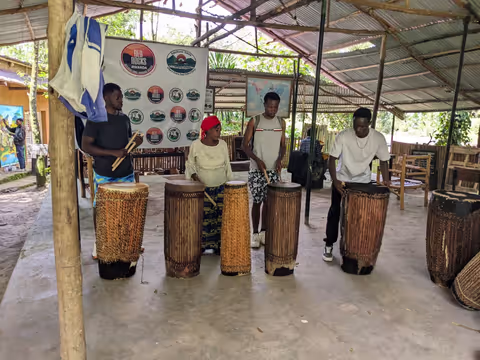 Musanze Caves & Traditional Banana Beer and Crafts Experience at Red Rocks - Culture & History Tour