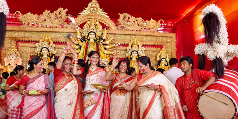 Experience Kolkata Durga Puja: Pandal Hopping, Food & Celebration