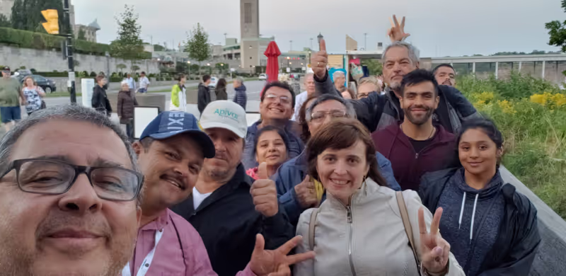 Toronto Private Tour - Guests from 10+ different countries excitingly waiting to board Hornblower cruise in Niagara Falls