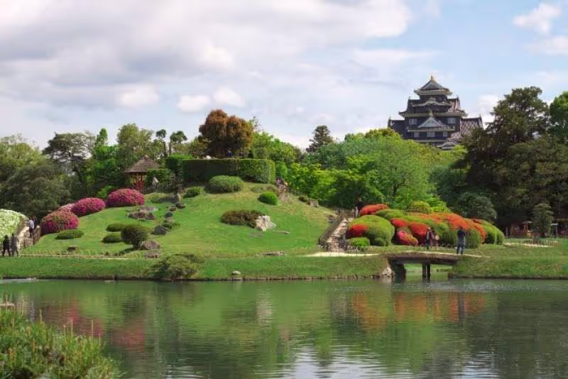 Okayama Private Tour - This is Korakuen Park in Okayama City. It is one of three most beautiful gardens in Japan. It was made for the Japanese feudal lord in Edo Period. The castle called ujo 'crow castle'  is near this garden. There are some ponds, streams, hills, some houses there. In any season you can see beautiful flowers and trees. It is a very large garden , and you can enjoy walking and a beautiful scenery.   