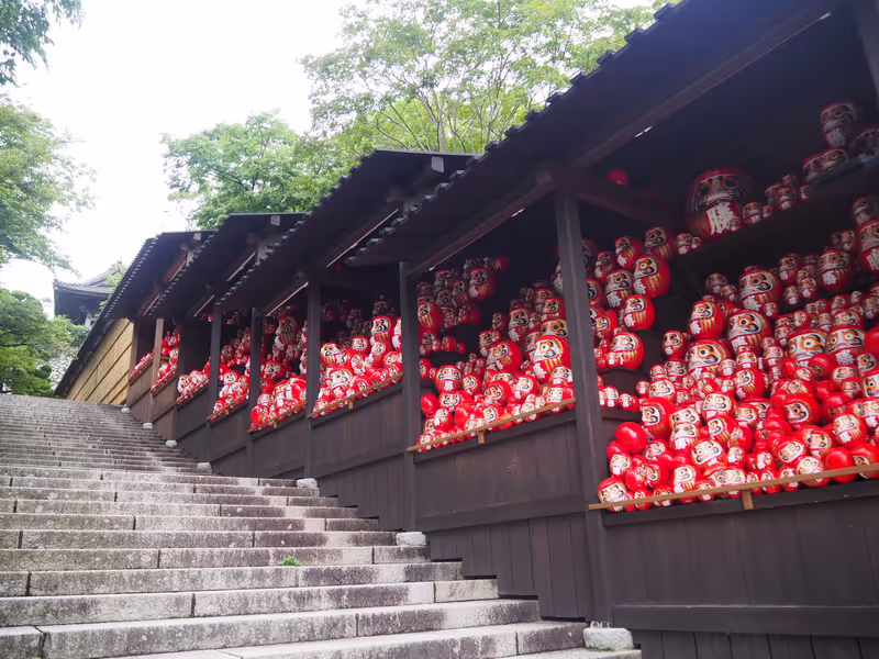 Osaka Private Tour - Katsuo-ji Temple is filled with Daruma statues.