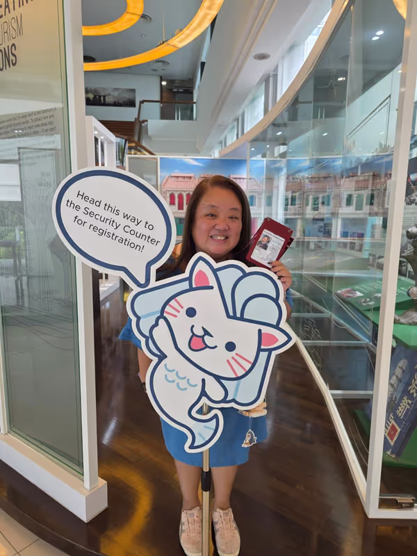 Singapore Private Tour - Me in STB with my pipping hot tourist guide badge!