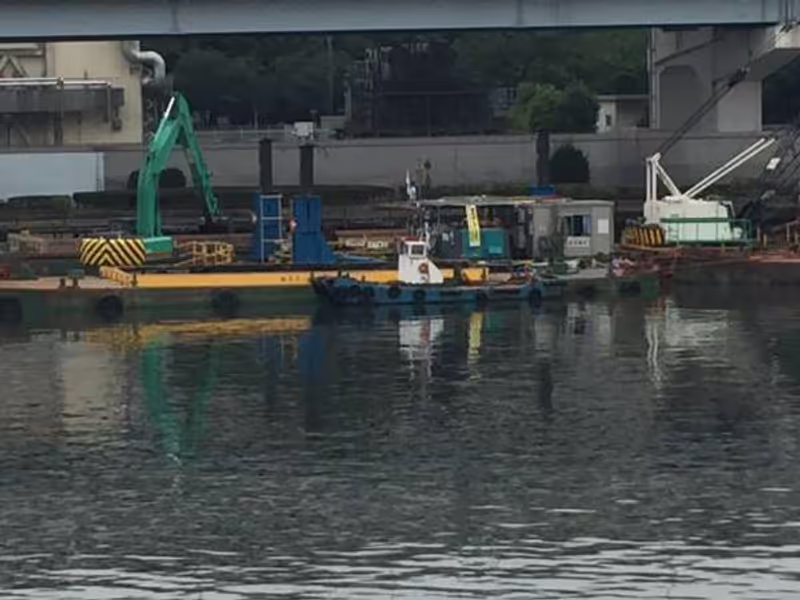 Tokyo Private Tour - A dredger boat in SUMIDA-GAWA river.