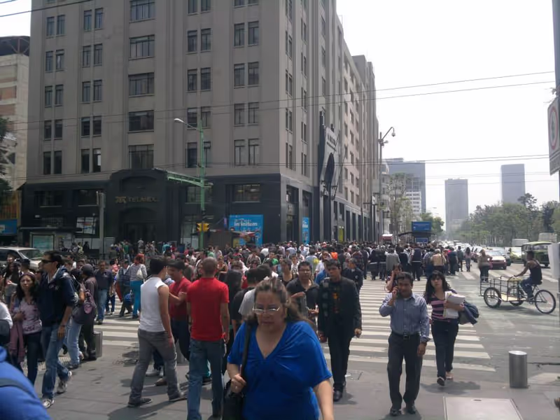Mexico City Private Tour - Pedestrian street from the central axis to the center, very busy with people. Corner Juarez avenue and Madero street.