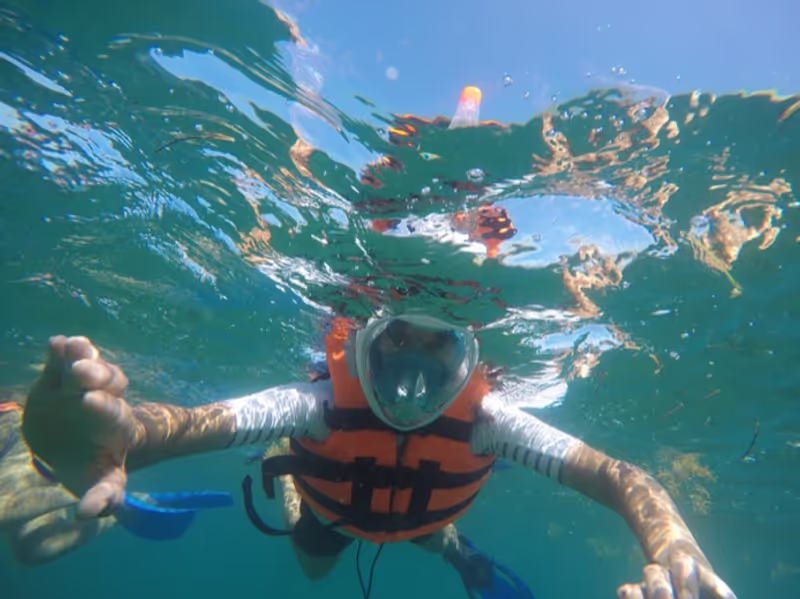 Cancun Private Tour - Snorkellers at the coral reef at Puerto Morelos