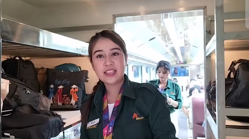 Jakarta Private Tour - train attendant at Panoramic train